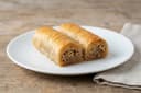 Saragli: Exquisite Greek Rolled Baklava with Walnuts and Syrup